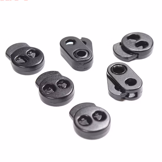 El precio de fábrica proporciona directamente la cerradura plástica del cordón del resorte del tapón del zapato de la cerradura del cordón de nylon del diseño